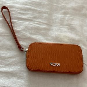 Tumi brunt orange wristlet